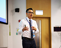 Mr. Charlie Nguyen, CEO of CMS Global delivers a keynote presentation at the symposium